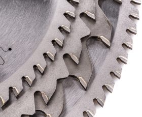 circular saws with teeth close-up, on a white background