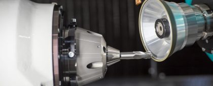 The operation of cutting tool making machine control by CNC program. The  cutting tools cutting grinding process by sharpening machine control by CNC program.